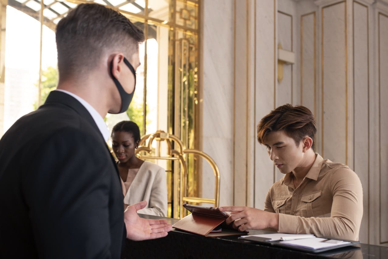 hotel receptionist at work Large